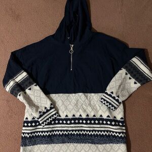 Navy and White V-Neck Sweater with Pattern